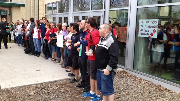 Gatineau university teachers, students barricade themselves inside school in protest.