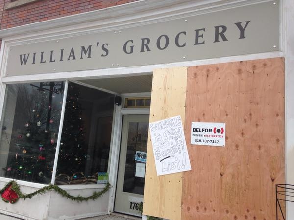 Damaged window at William's Grocery store