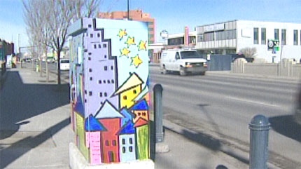 Artists having a ball with utility boxes