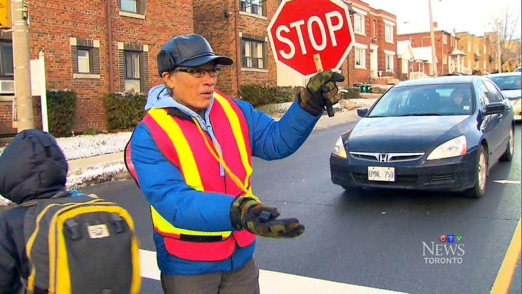 A crossing guard on duty in Toronto