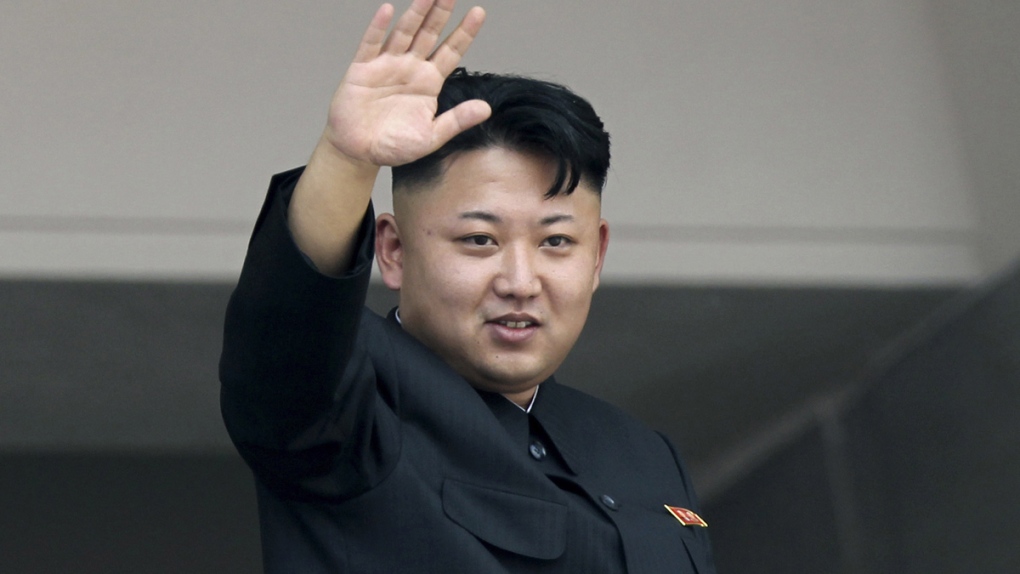 North Korea's leader Kim Jong Un waves
