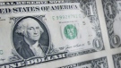 A sheet of U.S. one dollar bills. (AP / Victoria Arocho)