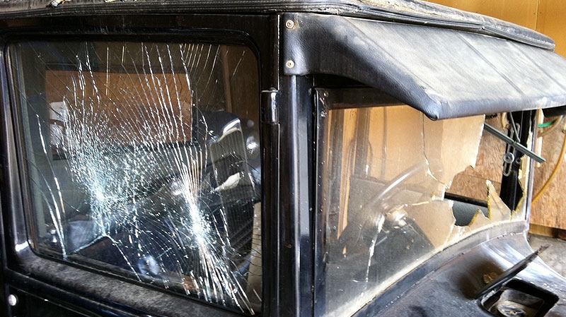 The windshield and windows of the 1925 Ford Model T were smashed in the incident. Thursday, April 19