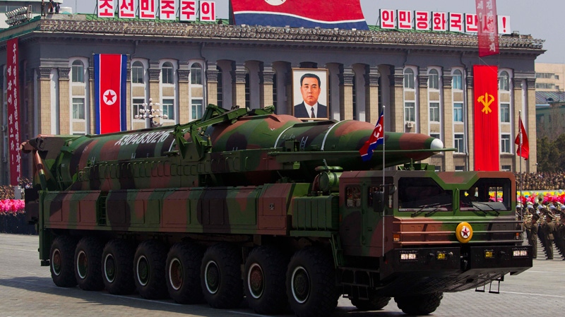 A North Korean vehicle carrying a missile passes by during a mass military parade in Pyongyang's Kim Il Sung Square to celebrate the centenary of the birth of the late North Korean founder Kim Il Sung on April 15, 2012. (AP / David Guttenfelder)