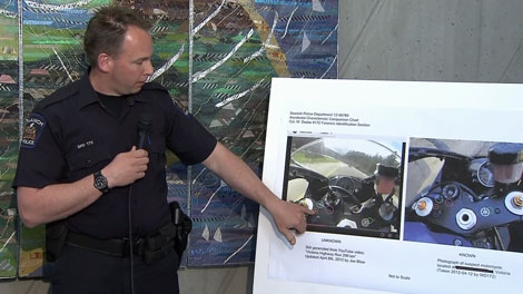 Const. Will Dodds shows similarities between a seized 2006 blue Yamaha R1 and one shown speeding at close to 330 kilometres per hour in a YouTube video. April 19, 2012. (CTV)