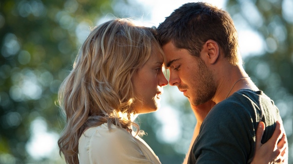 Taylor Schilling and Zac Efron in a scene from Warner Bros. 'The Lucky One.'