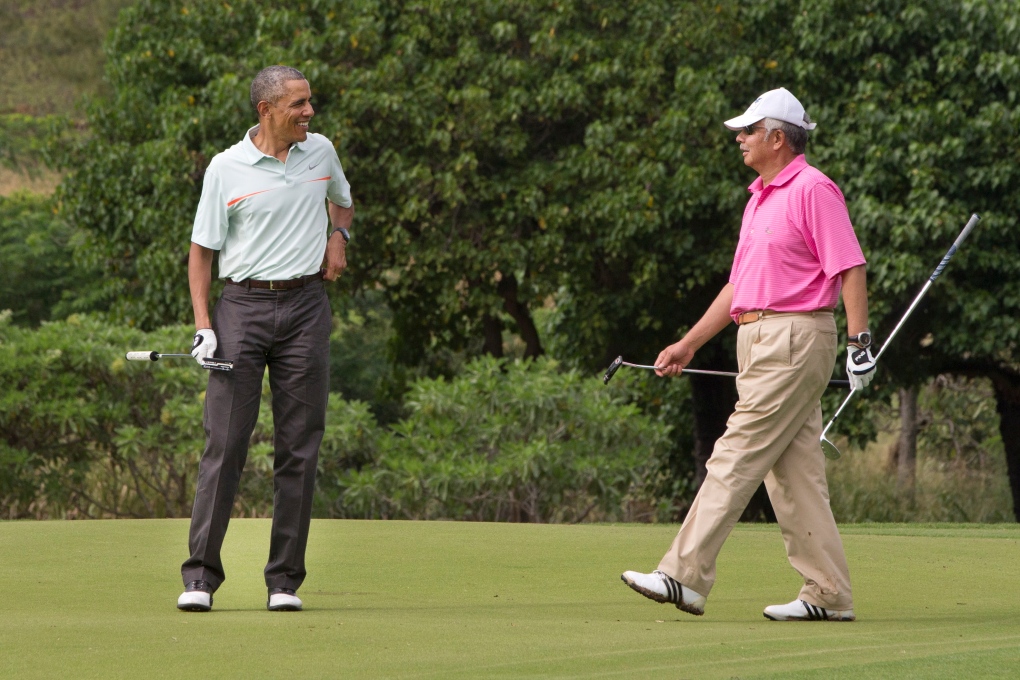 Barack Obama golfs with Malaysian PM 