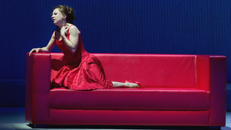 In this Friday, March 30, 2012 photo provided by the Metropolitan Opera, Natalie Dessay plays Violetta in a dress rehearsal of Verdi's "La Traviata," at the Metropolitan Opera in New York.