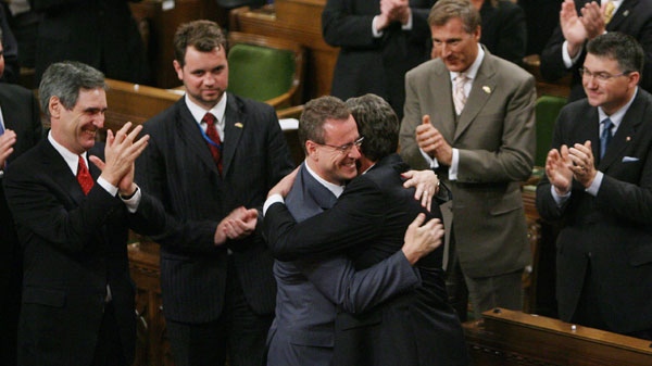 Ukrainian President Victor Yushchenko hugs Liberal MP Borys Wrzesnewskyj in the House of Commons on Parliament Hill in Ottawa, Monday, May 26, 2008. (Sean Kilpatrick / THE CANADIAN PRESS)
