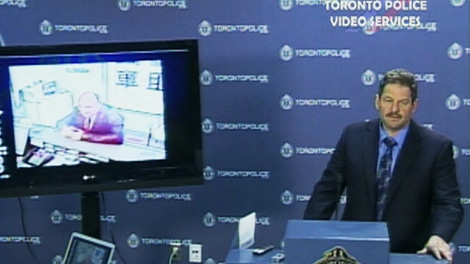 Staff. Insp. Mike Earl releases security footage of a man they believe rented a U-Haul van that three suspects used to escape the robbery on November 2011, at a press conference on Monday, April 23, 2012.
