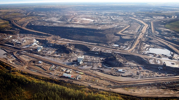 An aerial view of a tar sands mine facility near Fort McMurray, in Alberta, Sept. 19, 2011. (Jeff McIntosh / The Canadian Press)