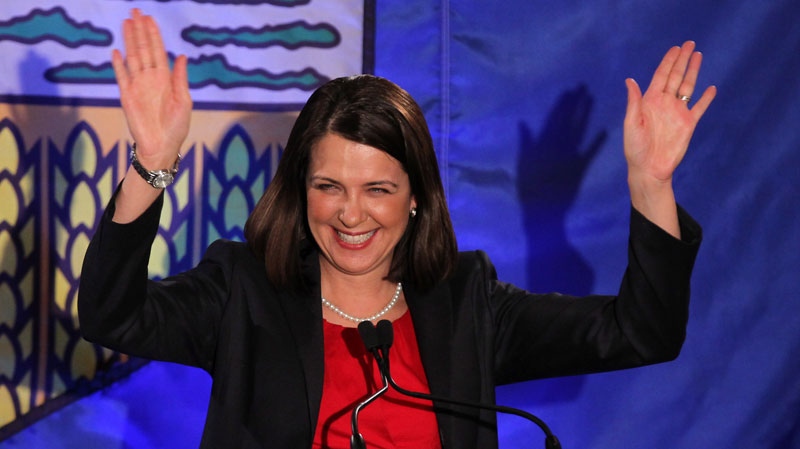 Wildrose Leader Danielle Smith waves to the crowd in High River, Alberta, Monday, April, 23, 2012. (Jonathan Hayward / THE CANADIAN PRESS)