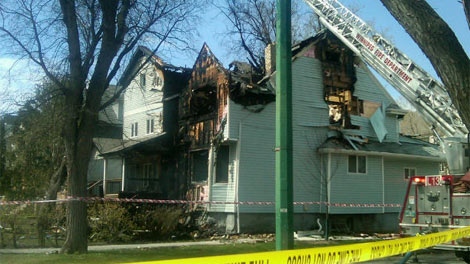 Damage is estimated at $1 million after the McMillan Ave. blaze gutted one home and damaged a second house in Winnipeg on April 24, 2012. 