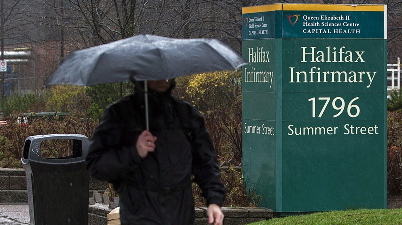 An unidentified man heads past the Halifax Infirmary in Halifax on Tuesday, April 24, 2012. THE CANADIAN PRESS/Andrew Vaughan