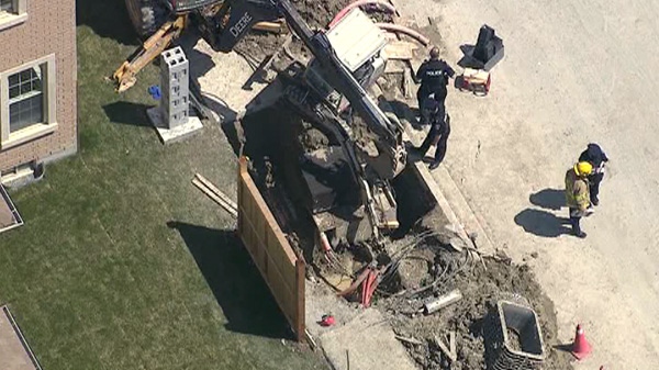 A construction worker was trapped near Woodbine Avenue and Elgin Mills Road after concrete fell on his leg Wednesday afternoon.