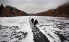 A couple skates on Grenadier Pond in Toronto's High Park on Dec. 29, 2010. (Darren Calabrese / THE CANADIAN PRESS)