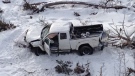 Severely damaged pickup truck following Sunday morning's fatal crash near the Ghost River
