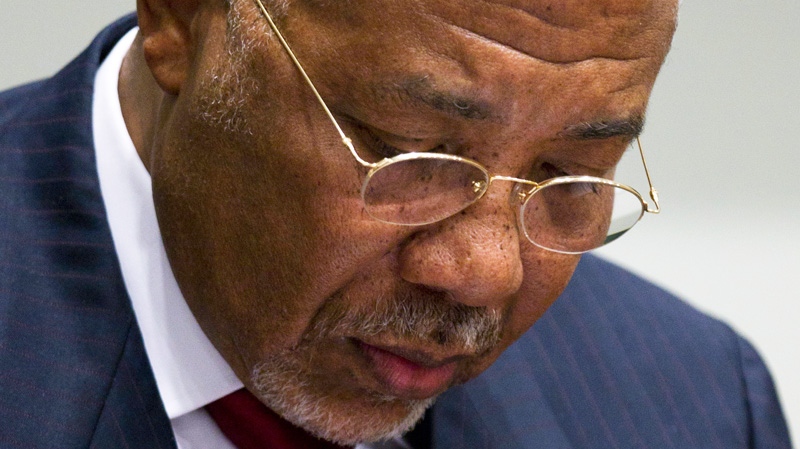 Former Liberian President Charles Taylor looks down as he waits for the start of a hearing to deliver verdict in the court room of the Special Court for Sierra Leone in Leidschendam, near The Hague, Netherlands, Thursday April 26, 2012.  (AP / Peter Dejong)