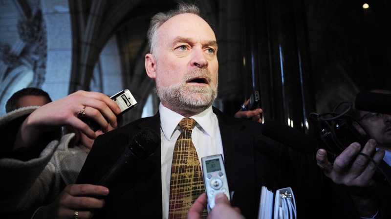 Auditor General Michael Ferguson speaks to reporters as he leaves a House of Commons public accounts committee looking into a report which accused National Defence of hiding the true cost of the multi-role F-35 jet on Parliament Hill in Ottawa on Thursday, April 26, 2012.(Sean Kilpatrick / THE CANADIAN PRESS)