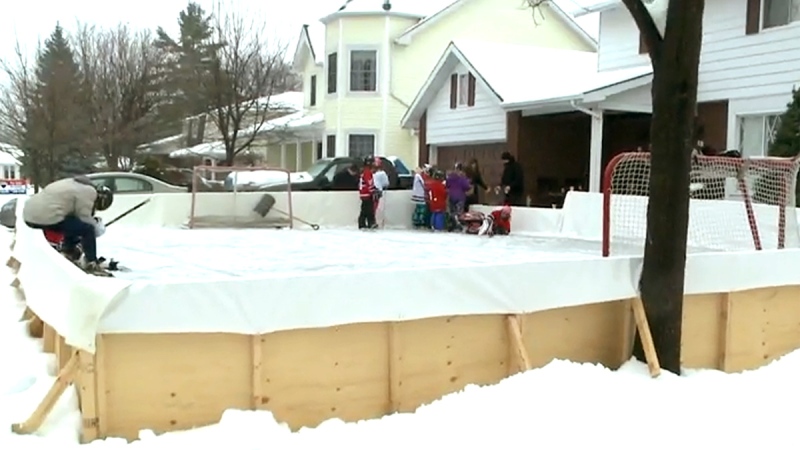 The Vincent family's ice rink on their front lawn in Cornwall, Ont., Monday, Jan. 5, 2014.