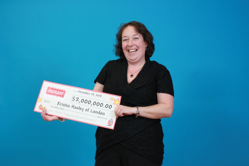 Kristin Hawley of London, Ont. picks up her lotto winnings at the OLG Prize Centre.