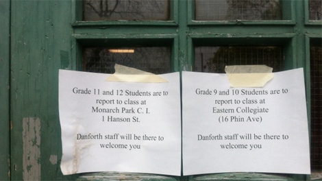 A note on the door of Danforth Collegiate and Technical Institute on Monday, April 30, 2012, tells students where to go while the school is closed.