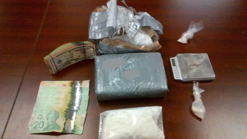 Cocaine and other items seized from a High Street, London, Ont. home on Thursday, Jan. 8, 2015 are seen in this image provided by the London Police Service.