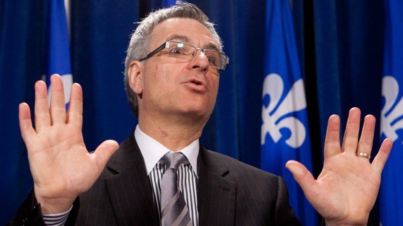 Quebec Justice Minister Jean-Marc Fournier comments on a government decision to go to court on the validity of Bill C-7 on senate reform Tuesday, May 1, 2012 at the legislature in Quebec City. (Jacques Boissinot / THE CANADIAN PRESS)
