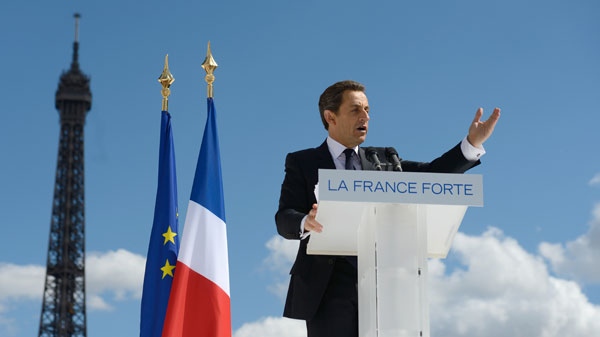 Nicolas Sarkozy delivers a speech during a campaign rally in front the Eiffel Tower in Paris, Tuesday May 1, 2012. (AP /Eric Feferberg)