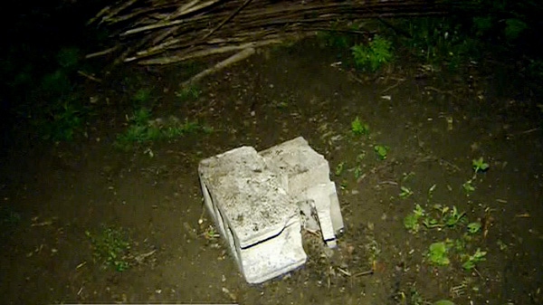 A cinder block is seen near Mayor Rob Ford's backyard where he claims a Toronto Star reporter was taking pictures of his home in Etobicoke on Wednesday, May 2, 2012.