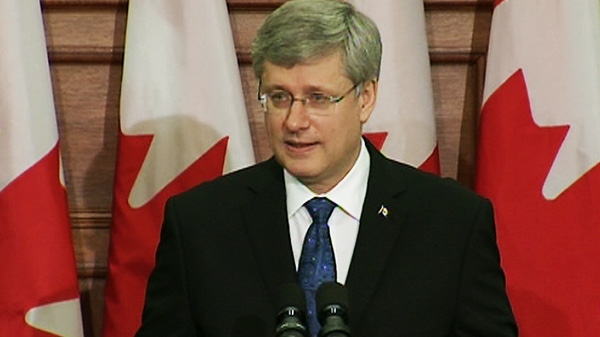 Prime Minister Stephen Harper speaks to the Conservative caucus one year after his party achieved a majority on Wednesday, May 2, 2012.