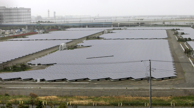 In this Wednesday, May 2, 2012 photo, solar panels cover the 11-hectare compound of the Ukishima Solar Power Station in Kawasaki near Tokyo. (AP Photo/Itsuo Inouye)