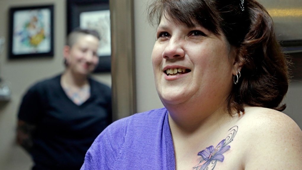 Cancer survivor Mari Jankowski with her new tattoo