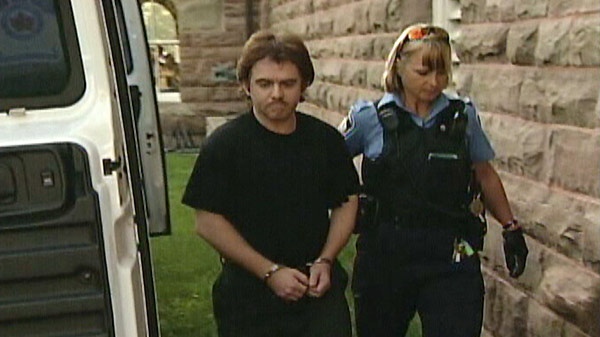 John Douglas Robinson is seen outside the courthouse in Woodstock, Ont. in this undated image taken from video.