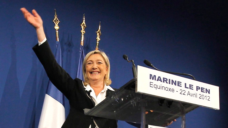 French far-right leader and National Front Party candidate for the presidential elections Marine Le Pen gestures to supporters after the first round of presidential elections, Paris, Sunday, April 22, 2012. (AP / Jacques Brinon)