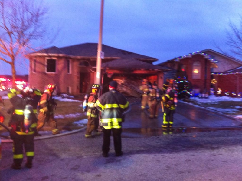 Fire crews battle a blaze in the 1900 block of Fuller Cres. in Windsor, Ont. on Monday, Jan. 19, 2014. (Adam Ward / CTV Windsor)