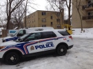 Police cruisers are seen in the area where a stabbing took place overnight in London, Ont. on Tuesday, Jan. 20, 2015. (Sean Irvine / CTV London)