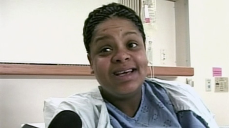 Shireen Anderson, 32, speaks to reporters after giving birth to a baby girl on Tuesday, May 8, 2012.