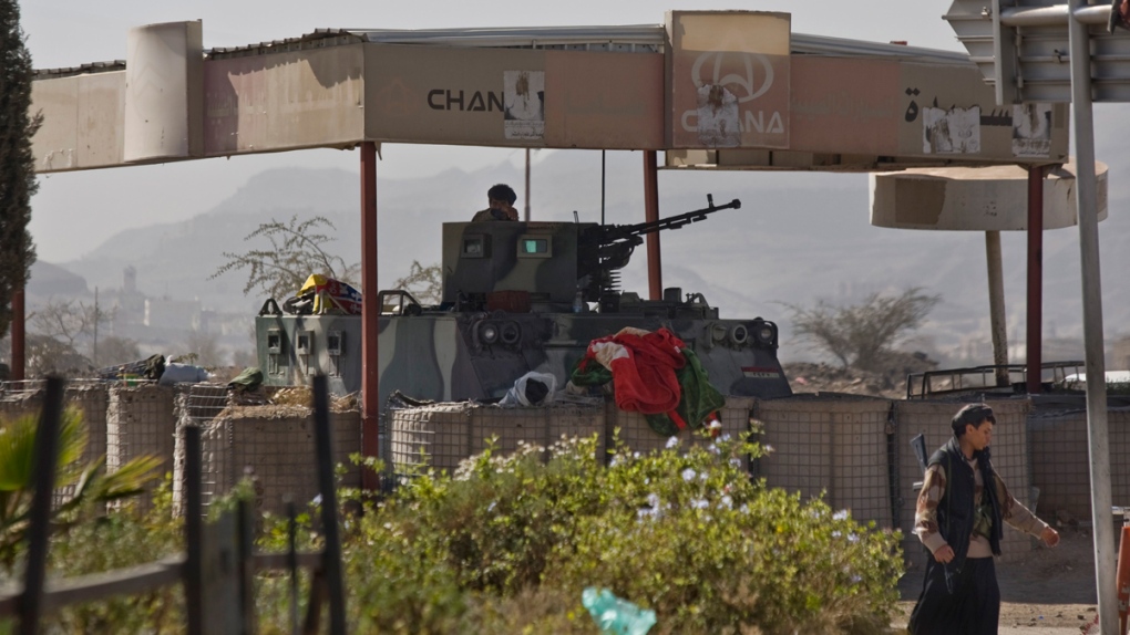 Houthi Shiite Yemeni mans a machine gun in Sanaa