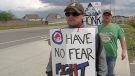 Striking Reliance Home Comfort workers picket in Cambridge, Ont. on Wednesday, May 9, 2012.