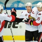 Ottawa Senators Daniel Alfredsson , second left, is congratulated by Jason Spezza , left and Brian Lee after the 2nd goal in the friendly ice-hockey match between Frolunda HC and Ottawa Senators at the Scandinavium arena in Gothenburg, Sweden, Thursday Oct 2, 2008. (AP Photo / Bjorn Larsson Rosvall / SCANPIX) ** SWEDEN OUT