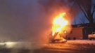 A commercial truck is engulfed in flames in a parking lot near Brighton Road and Old Tecumseh Road, Jan. 22, 2015. Submitted by Tom Stergianis. 