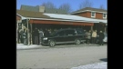 A hearse sits outside the Elliott-Madill Funeral Home where family of Ethan Taylor and Gwen Janes gathered in Mt. Brydges, Ont. on Monday, Jan. 26, 2015. (Jeff Santin / CTV London)