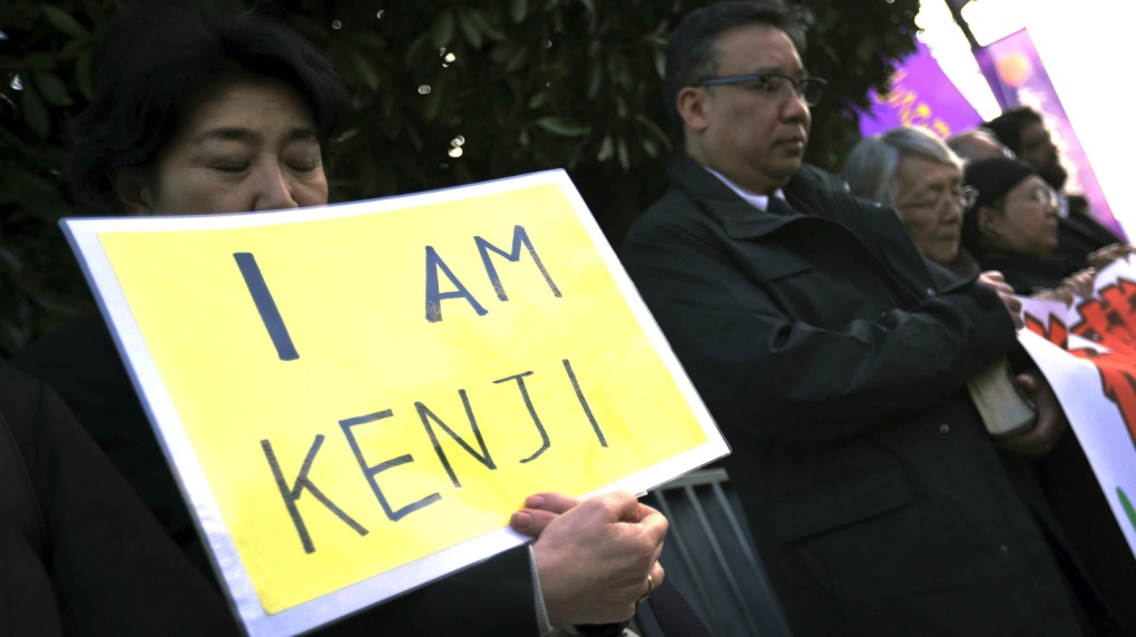 Japanese protesters support captured journalist
