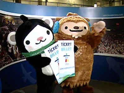 Vancouver 2010 Olympic Games mascots Miga, left, and Quatchi pose during a photo-op in front of a billboard promoting tickets to the Games in Vancouver, B.C., on Thursday October 2, 2008. (THE CANADIAN PRESS/Darryl Dyck)