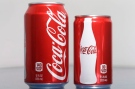A 7.5-ounce can of Coca-cola, right, is posed next to a 12-ounce can for comparison, Monday, Jan. 12, 2015 in Philadelphia. (AP / Matt Rourke)