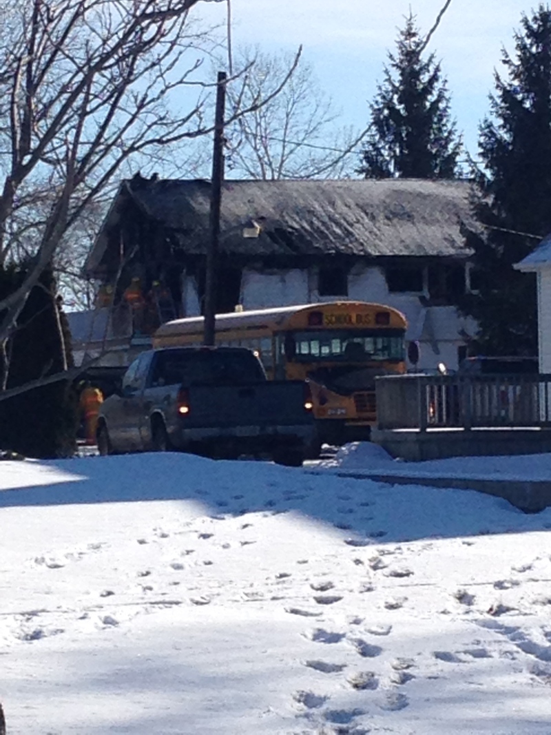 A home on St. Clair Parkway damaged in a fatal fire is seen south of Courtright, Ont. on Wednesday, Jan. 28, 2015. (Cristina Howorun / CTV London)