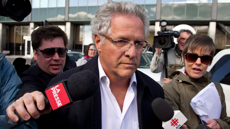 Quebec construction magnate Tony Accurso leaves the Quebec Provincial Police headquarters after being arrested for charges of fraud along with 13 others in Montreal, Tuesday, April 17, 2012.  (Paul Chiasson / THE CANADIAN PRESS)