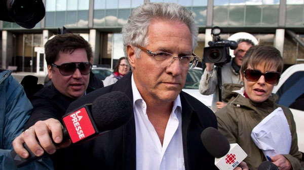 Quebec construction magnate Tony Accurso leaves the Quebec Provincial Police headquarters after being arrested for charges of fraud along with 13 others in Montreal, Tuesday, April 17, 2012. (Paul Chiasson / THE CANADIAN PRESS)