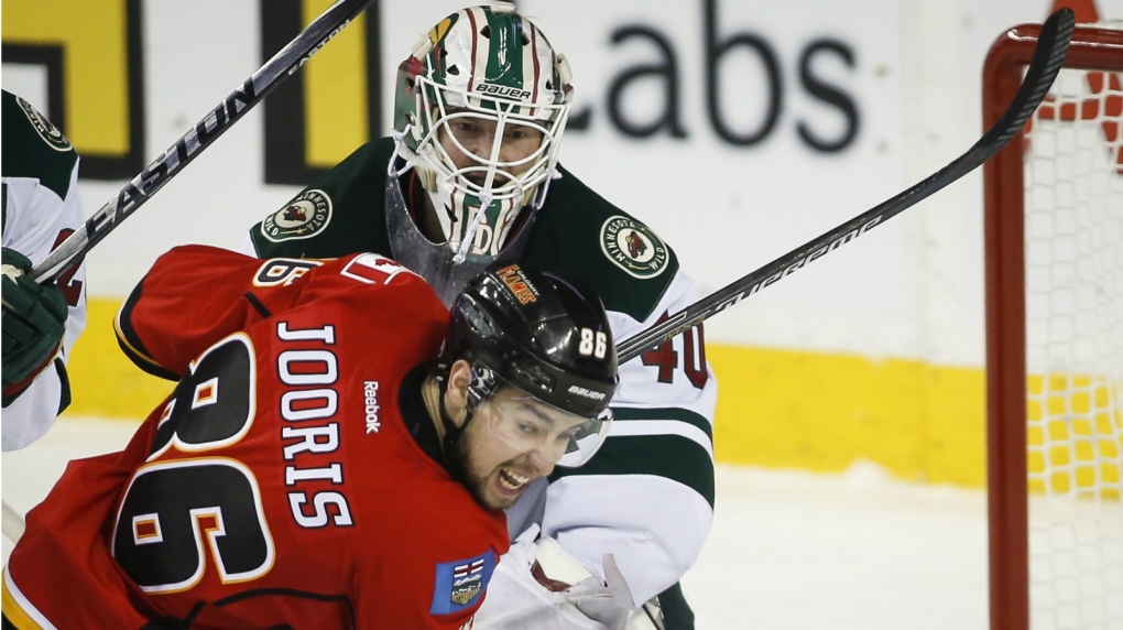 Dubnyk stays perfect as Wild douse Flames